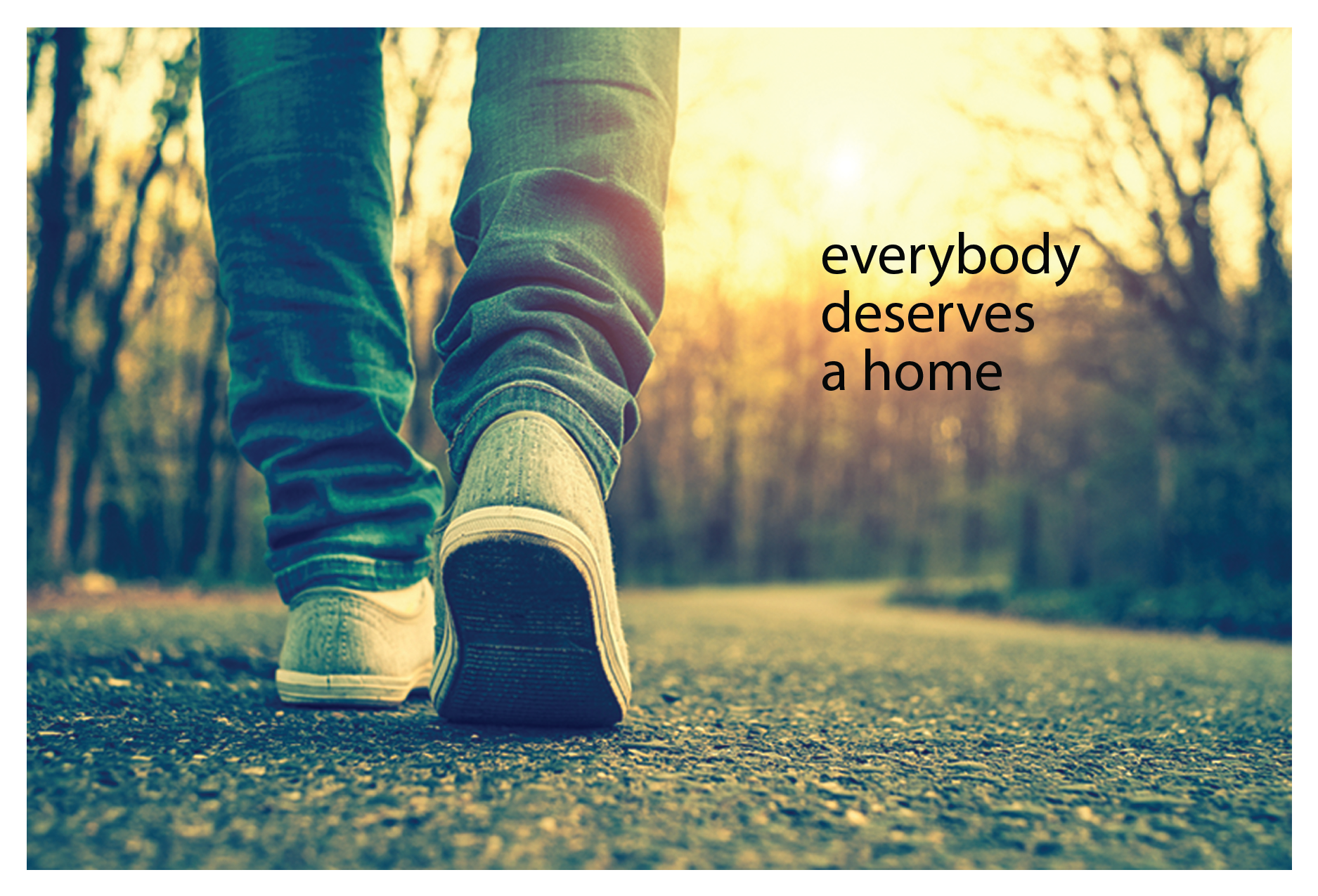 Feet in sneakers walking on a trail and the text on the image reads " everybody deserves a home"